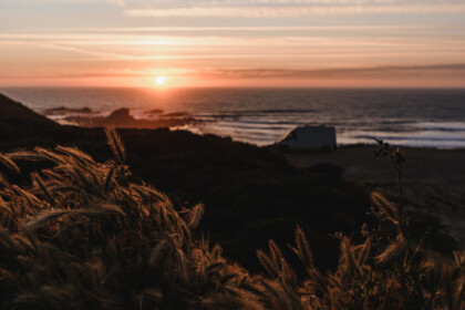 Ponta ruiva surf spot, parking with van, vanlife. beach break in background, sunset view